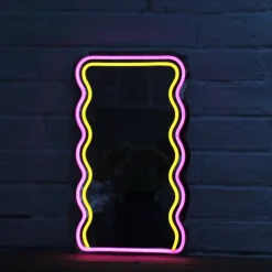 Xenos Wandspiegels-Spiegel met golven LED - geel/roze - 40x23x1.4 cm